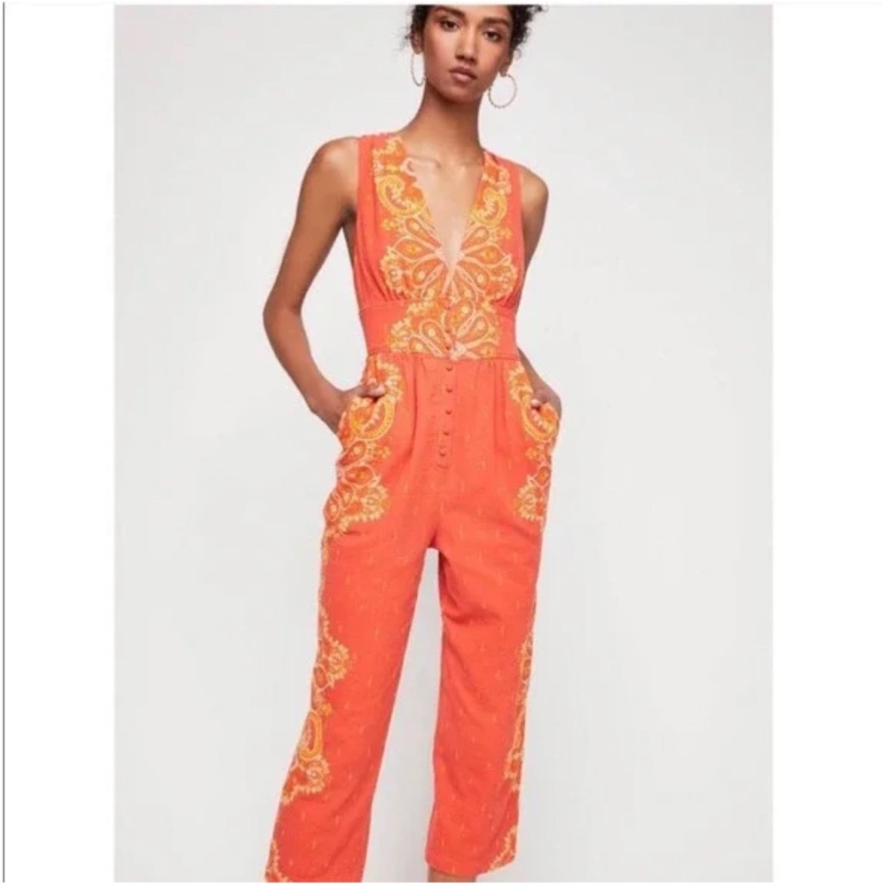 Free People’s Setting Sun Printed Orange Cropped Jumpsuit NWOT